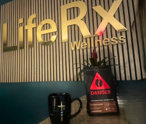 Danger Coffee Willis bag in front of the LifeRx Wellness sign