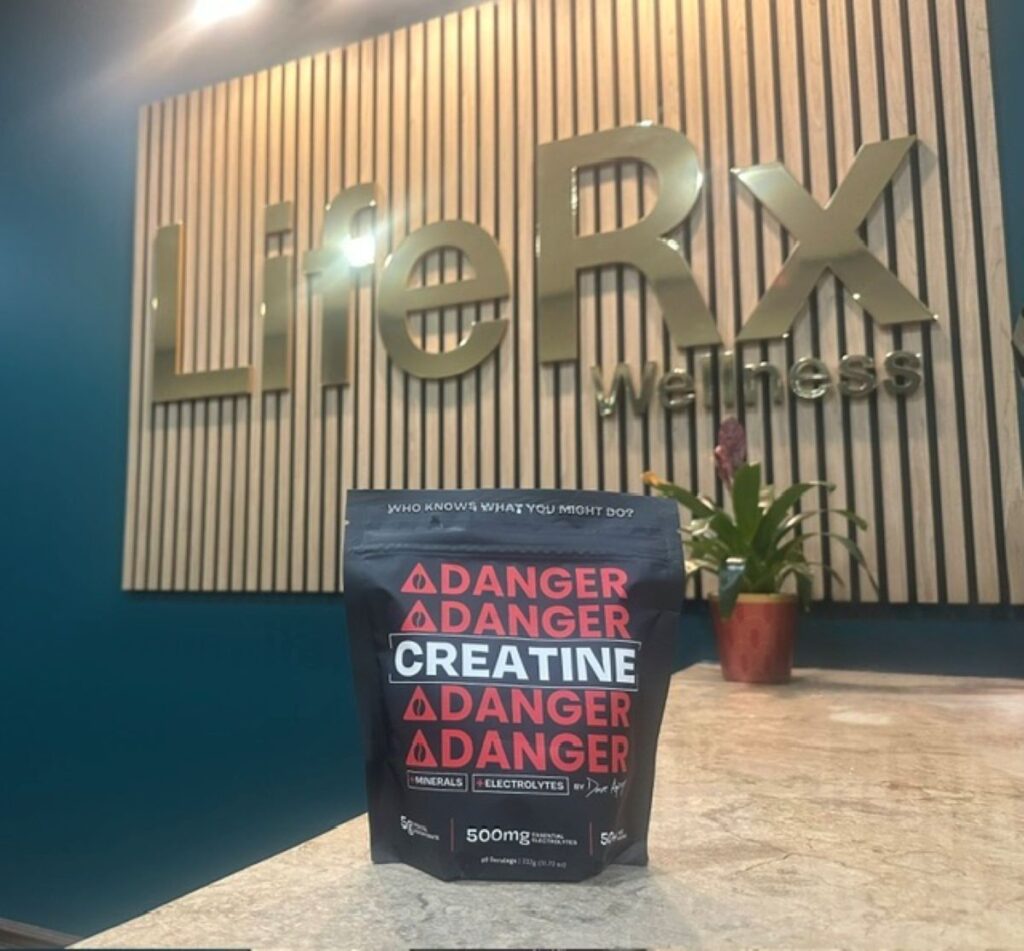 Danger Creatine Willis tub displayed in front of the gold LifeRx Wellness sign
