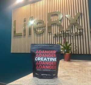 Danger Creatine Willis tub displayed in front of the gold LifeRx Wellness sign